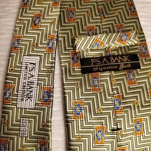 JoS A Bank Signature Gold Tie Limited Edition